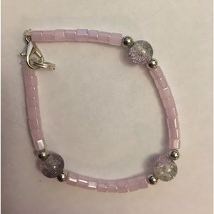 This bracelet is made of string